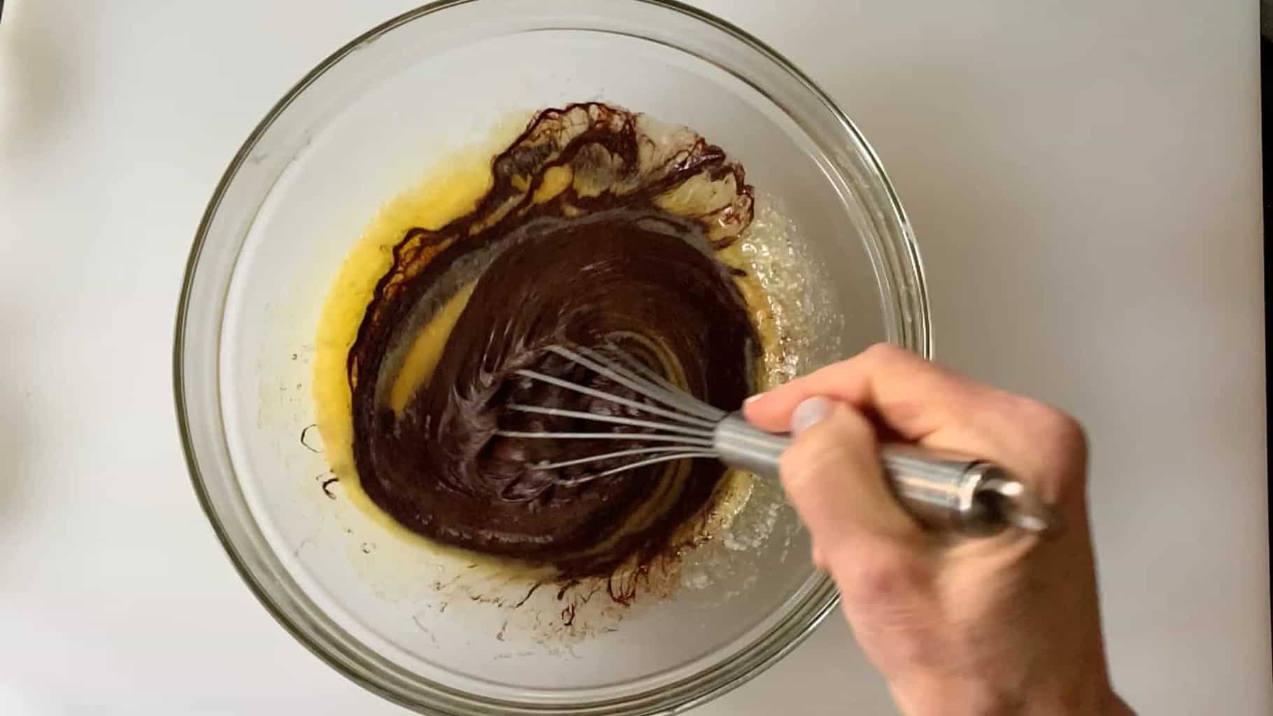adding melted unsweetened chocolate