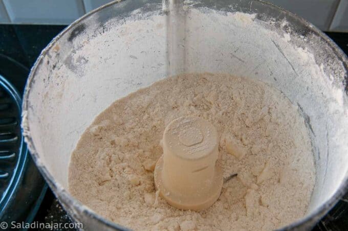 Cutting butter into flour in food processor bowl