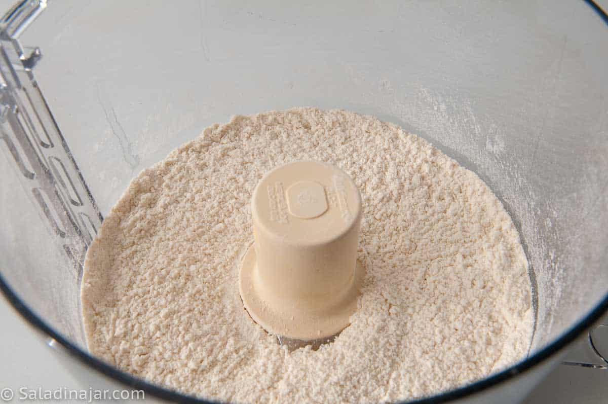 mixing flour in food processor bowl