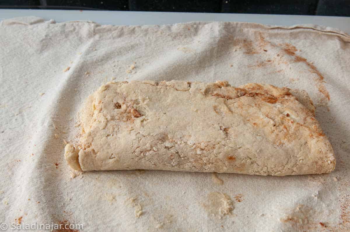 Folding the lower third of the dough