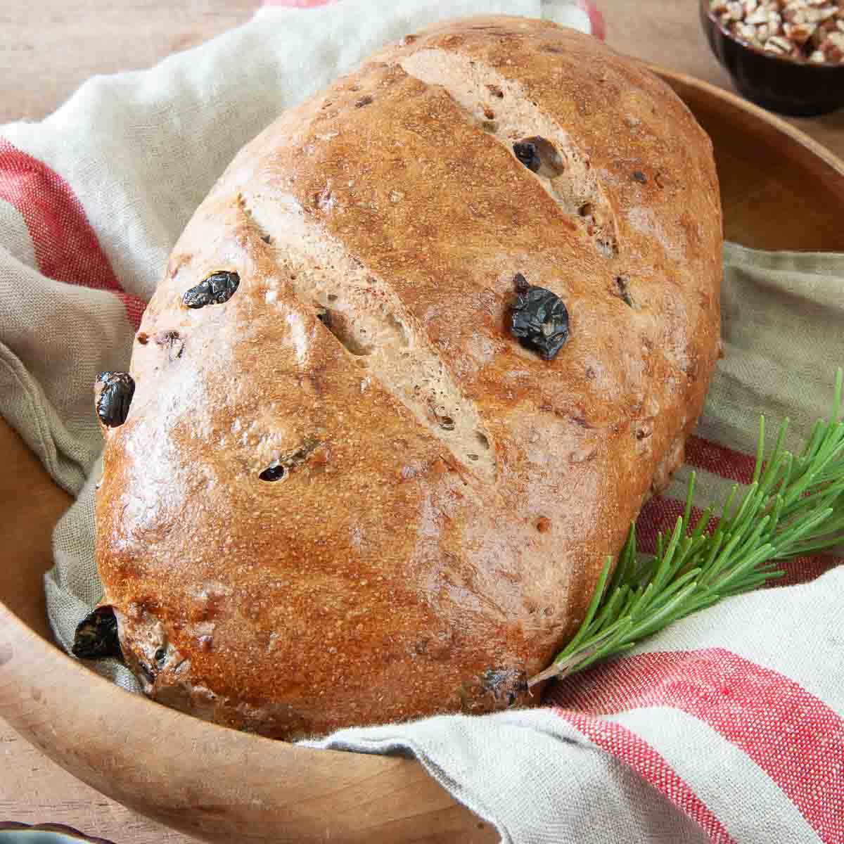 uncut loaf of artisan bread