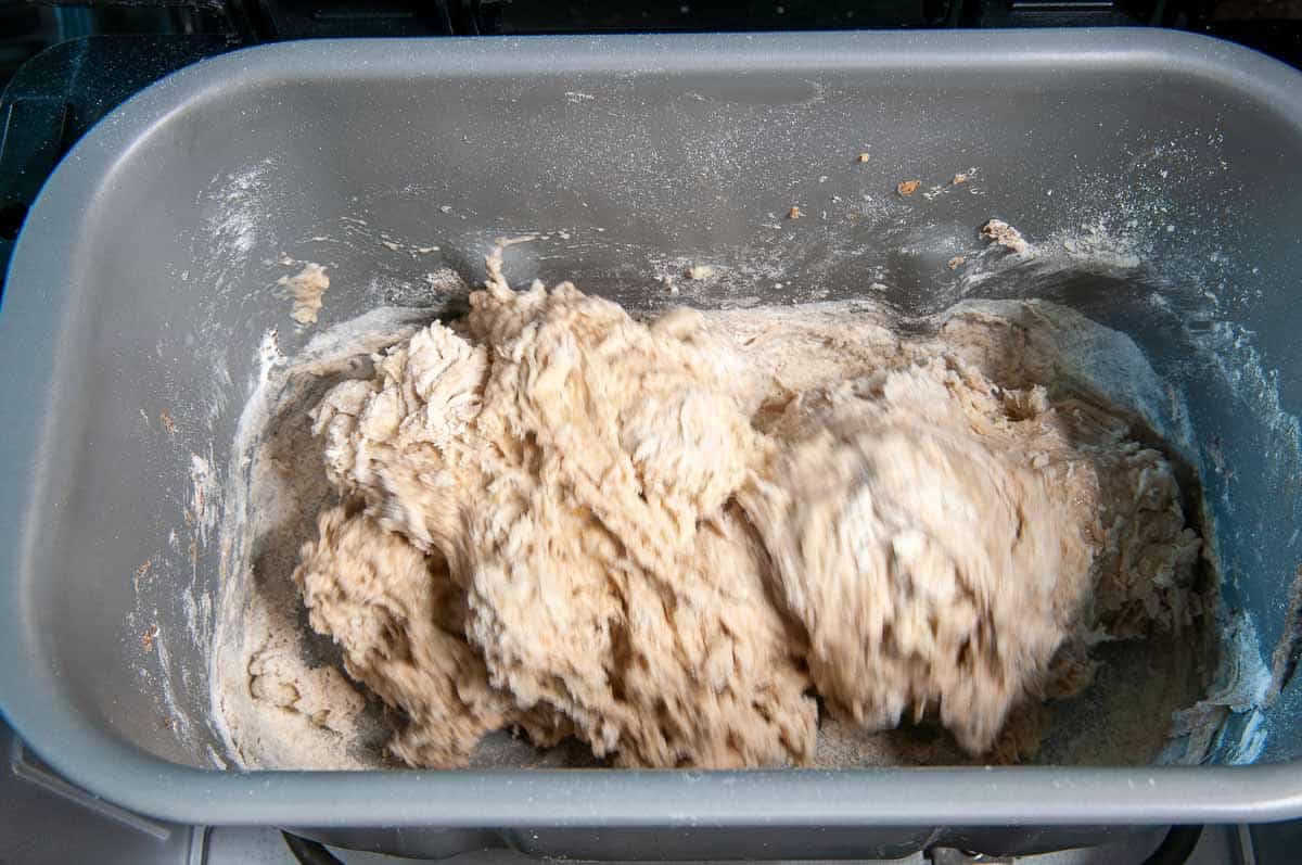 one minute after starting the machine, dough should start to clump