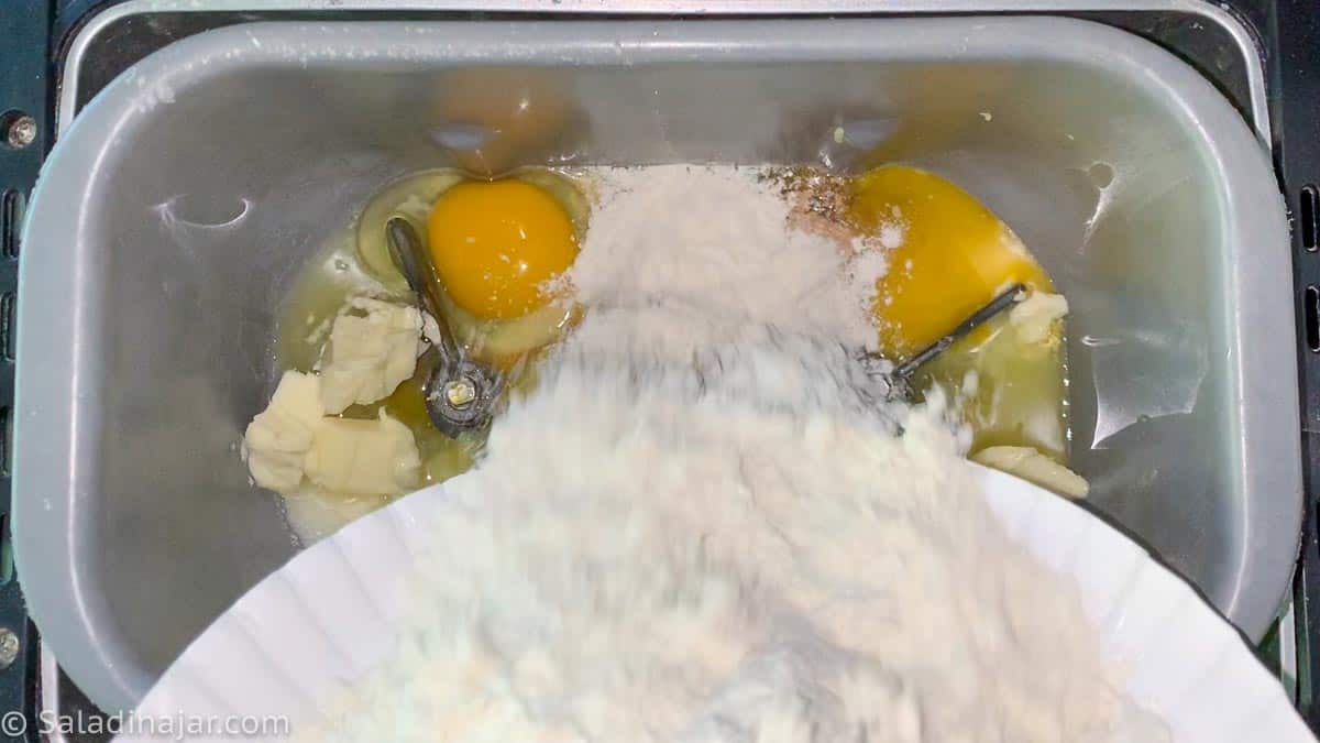 All ingredients for the bread dough added to the machine.