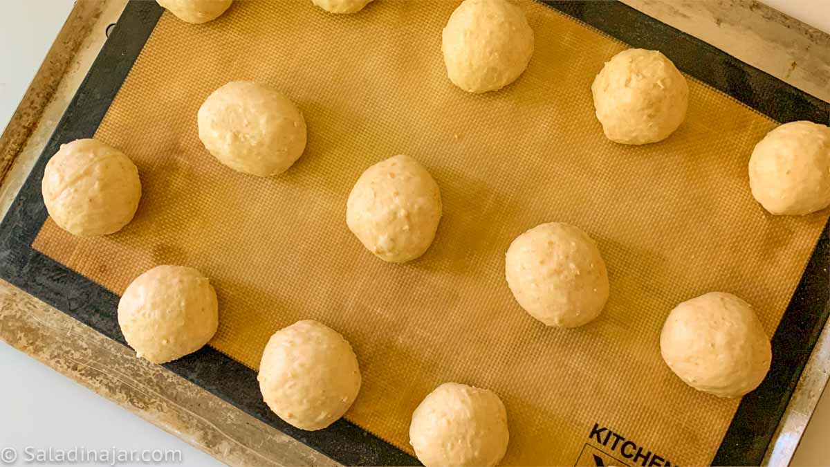 balls of dough arranged on a cookie sheet