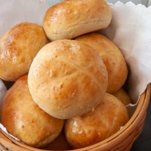 baked honey oatmeal rolls in a basket