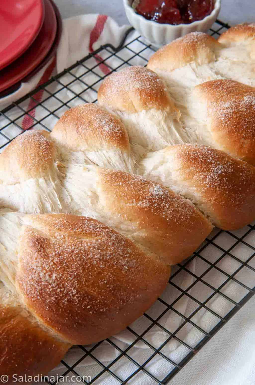 Swedish Cardamom Braid with sugary topping-- bread on cookie sheet
