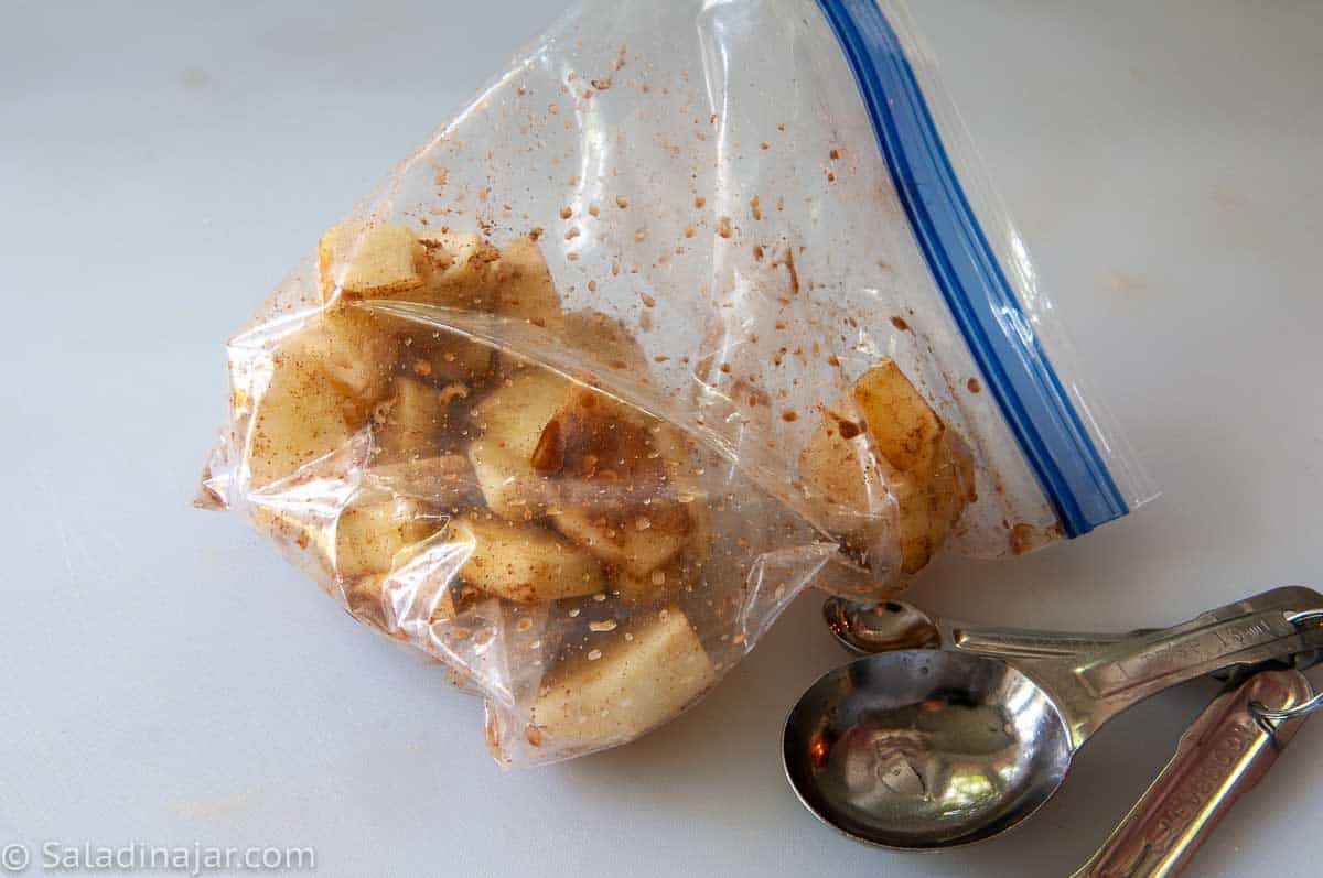 raw apples ready to cook in a microwave