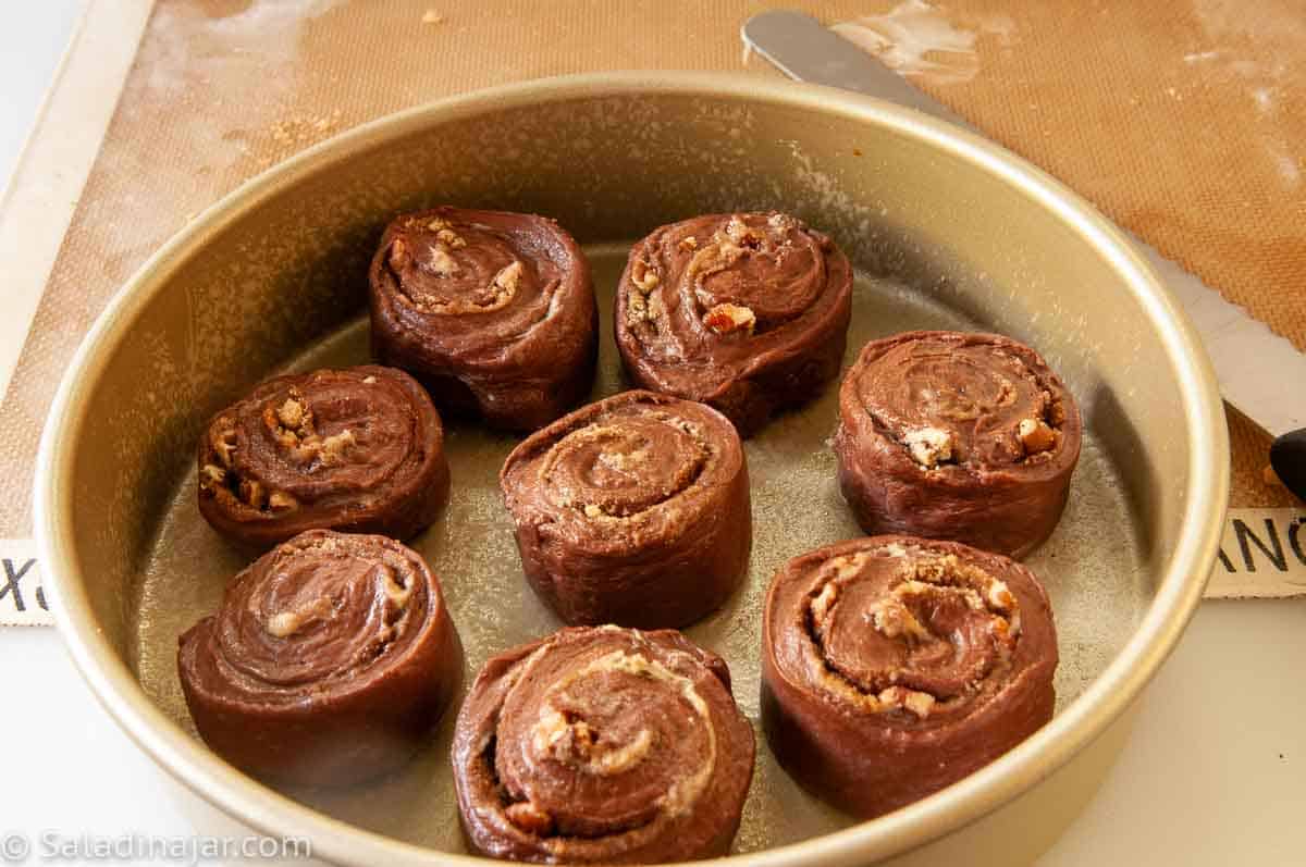 chocolate cinnamon roll slices before they rise