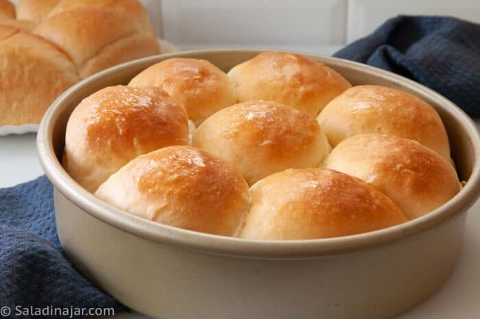 Finished bread machine dinner rolls before removing from the pan to a cooling rack