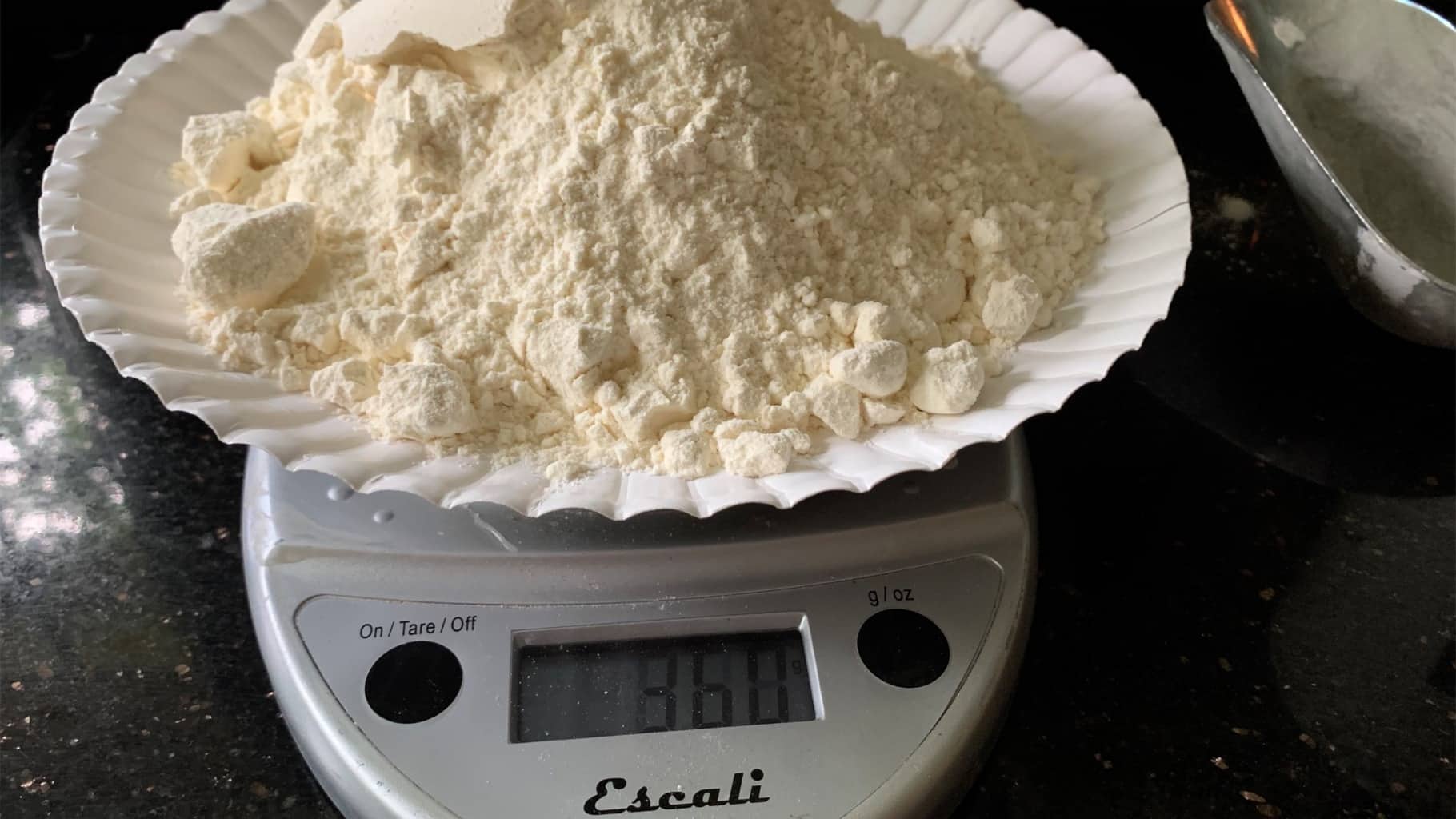 weighing flour on a digital scale