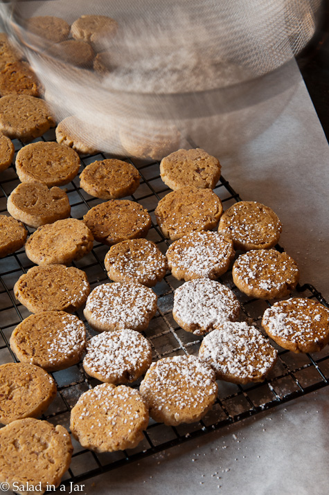 using a sieve to sprinkle many cookies at once