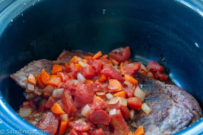 chuck steak in the crockpot with chopped veggies