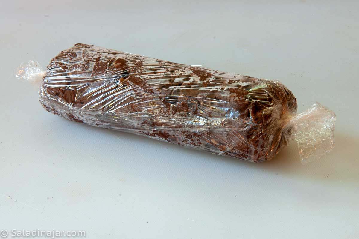 log of cookie dough wrapped to put in the refrigerator or freezer