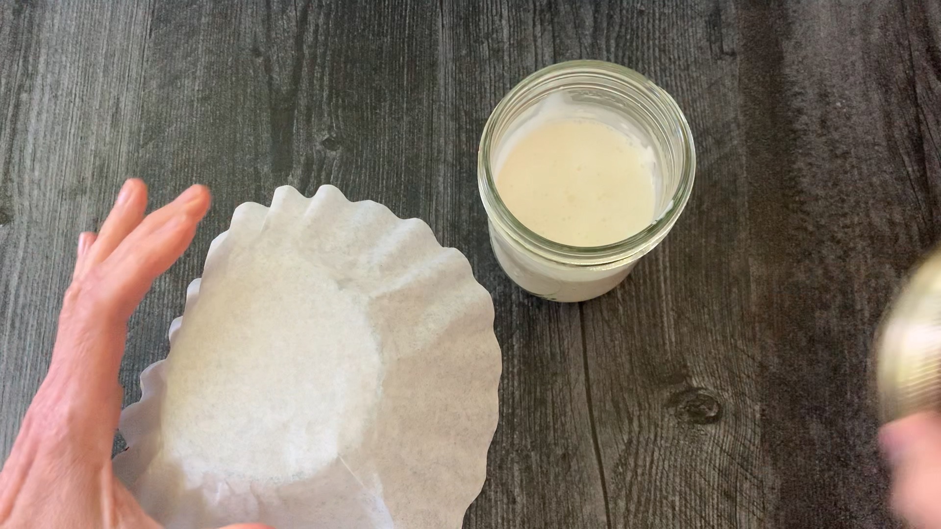 covering jar with something that allows oxygen to pass through it.