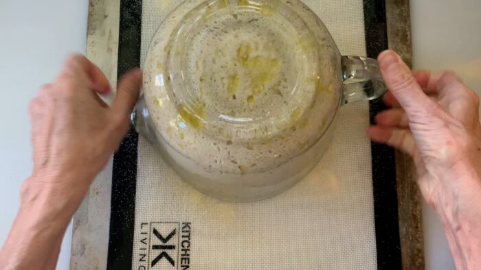 releasing the dough from the bowl