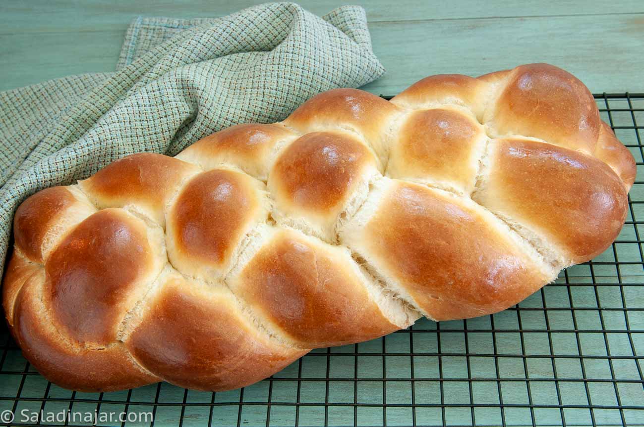 4-Braid baked Challah on a cooling rack