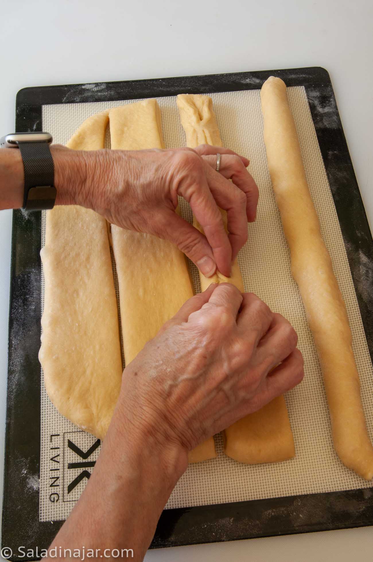 making cylinders of dough