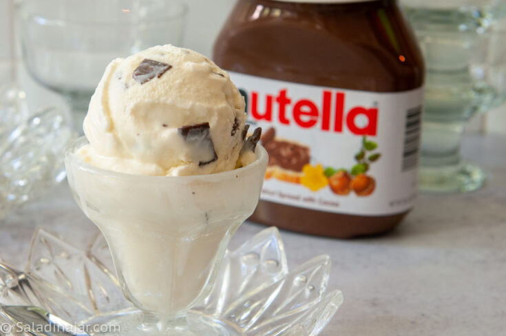 Crème Fraîche Ice Cream in a dish with Nutella jar in the background