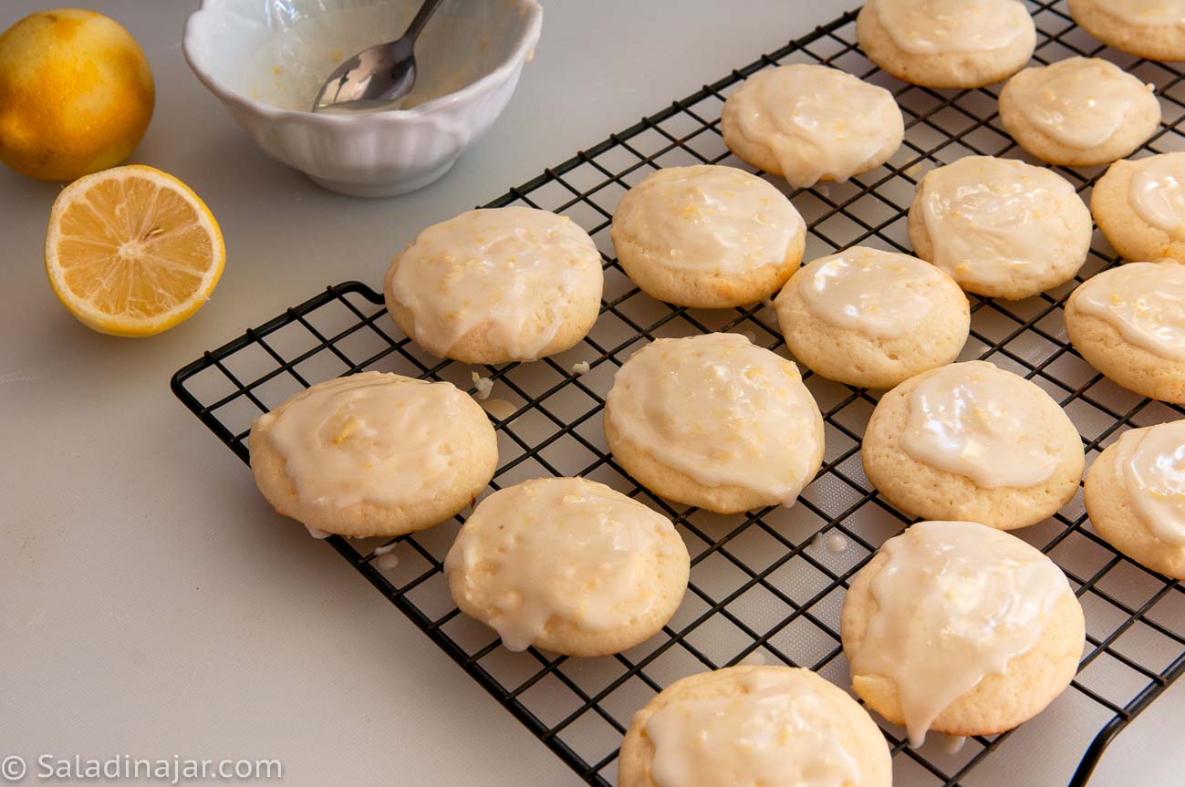 cookies cooling on a rack, then frosted