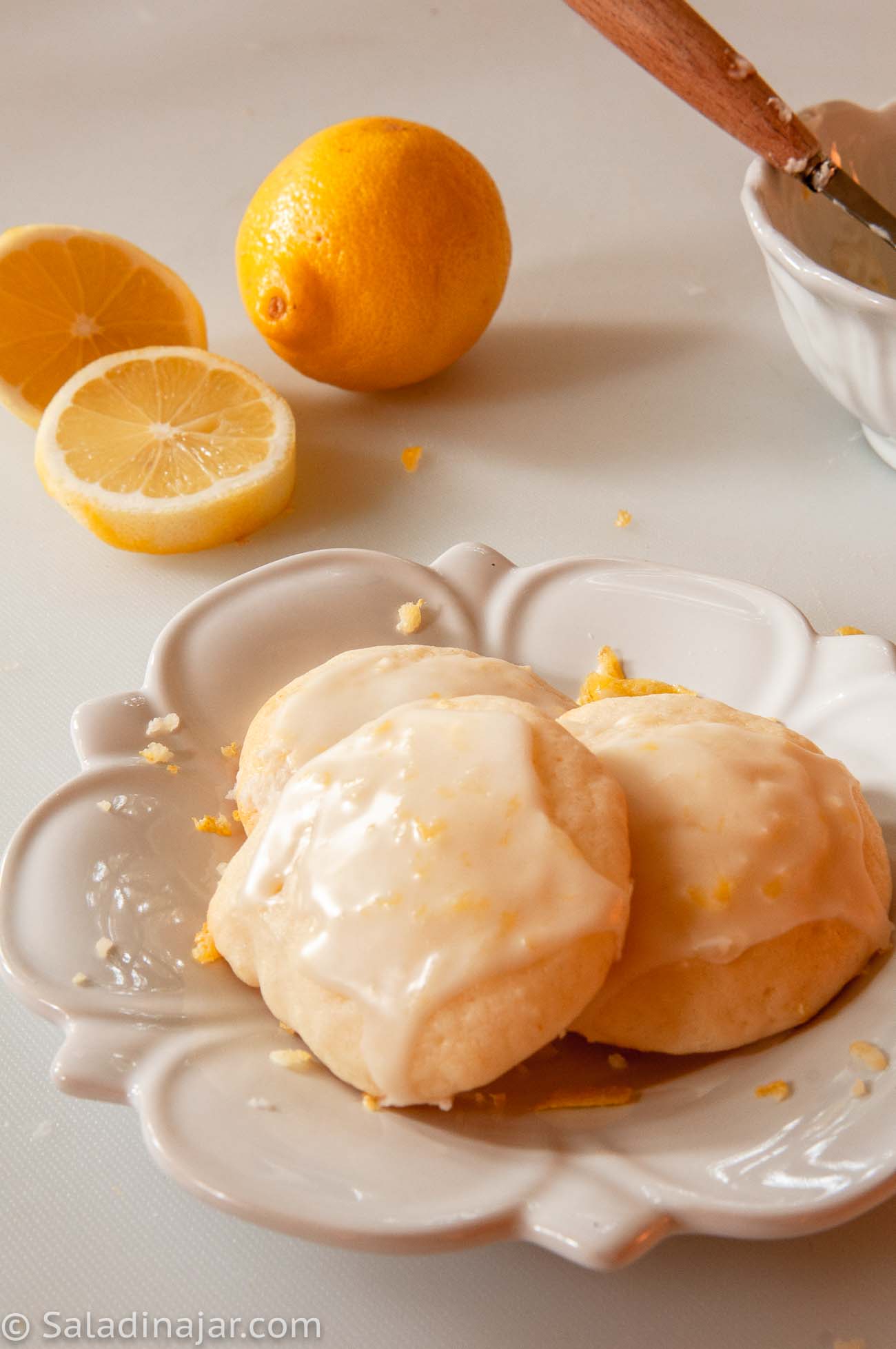 Greek yogurt cookies with lemon frosting:  lemons in background
