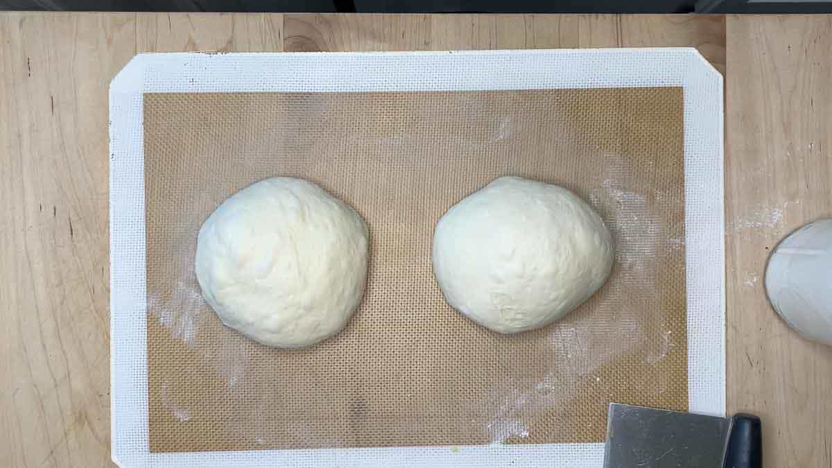 divide the dough in half and make two balls.