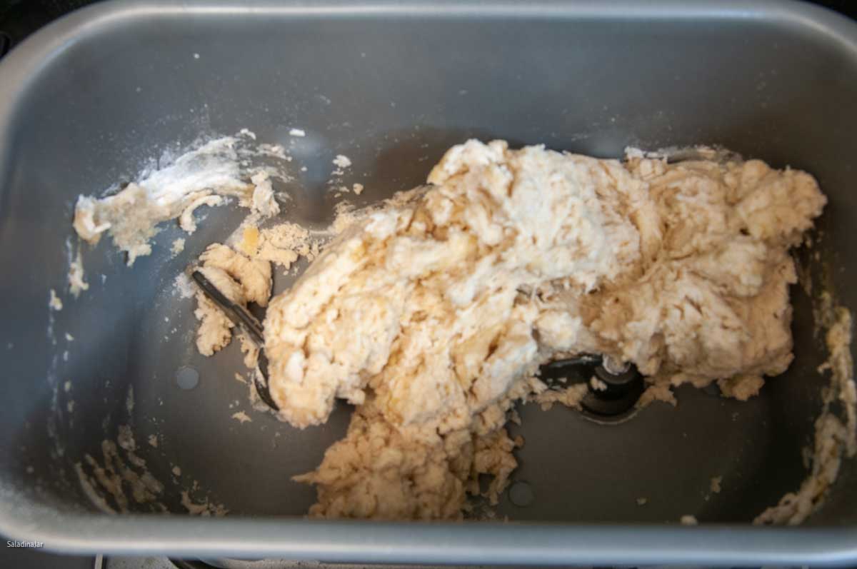 the dough should start to clump like this during the first minute.