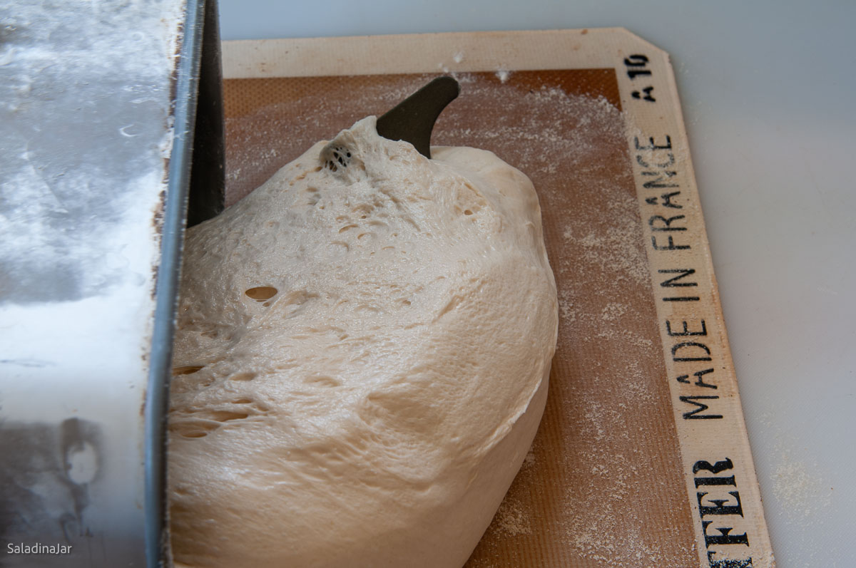 taking dough out of the pan