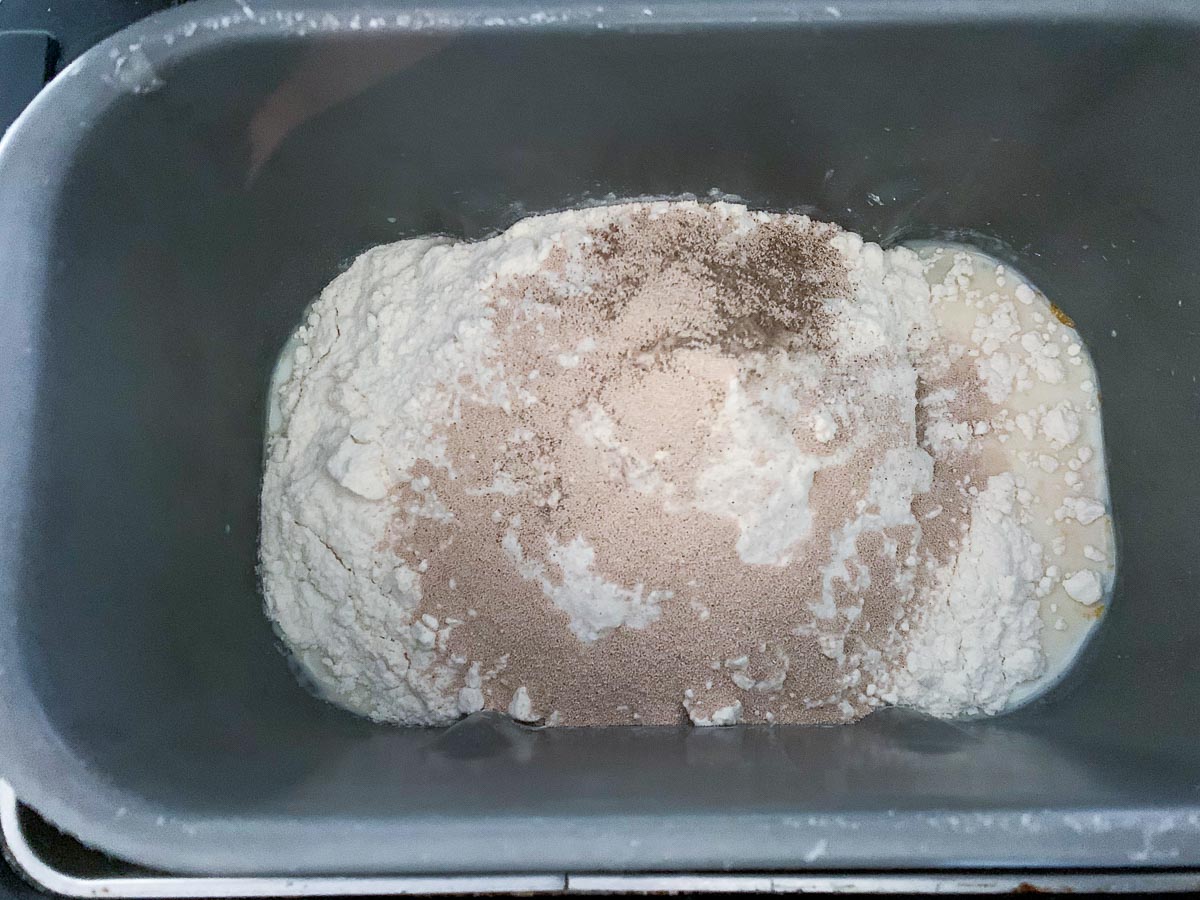 dough ingredients in bread machine pan