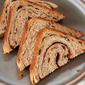 sliced cinnamon-raisin bread made with a bread machine