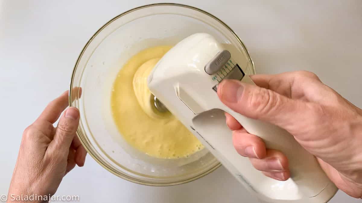 Mixing sugar and eggs