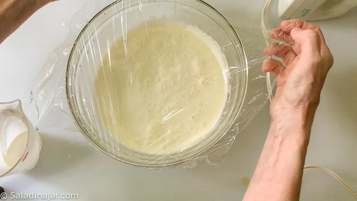 covering unfrozen ice cream mixture