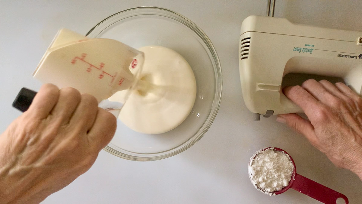 whipping cream with a portable mixer