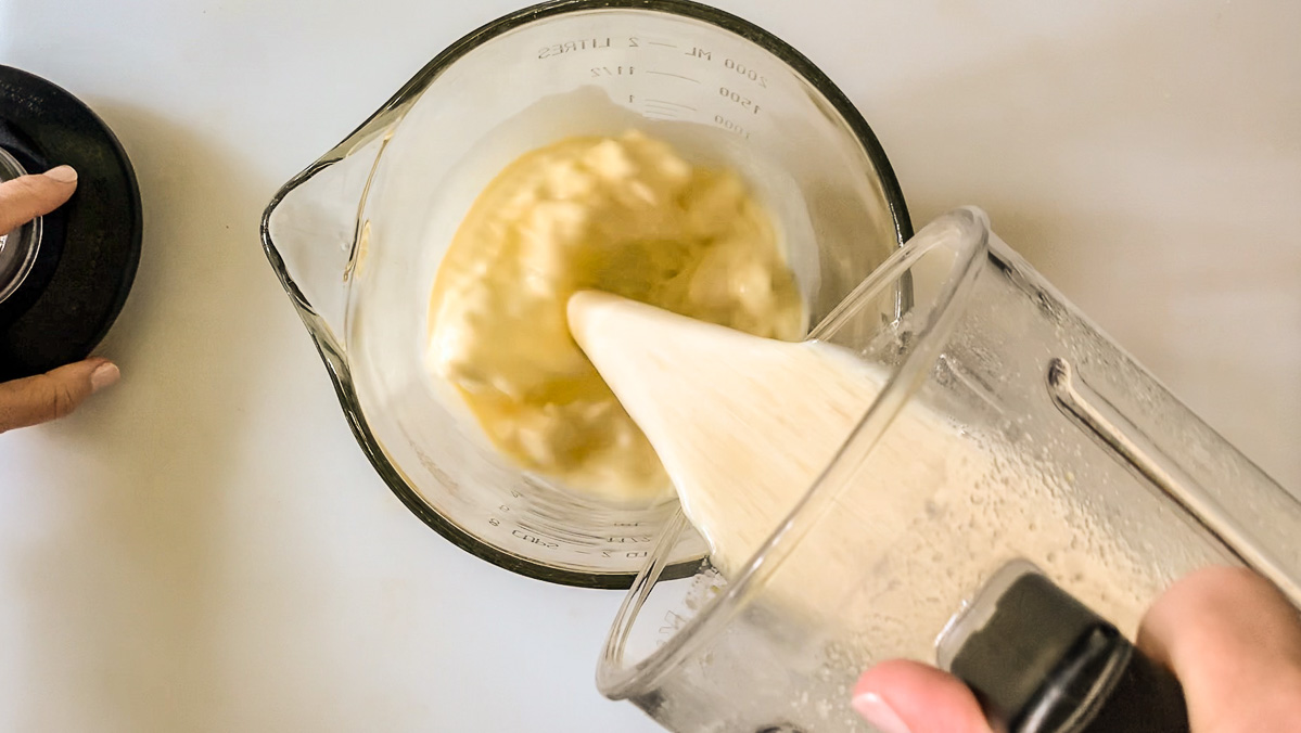 pouring milk into blender