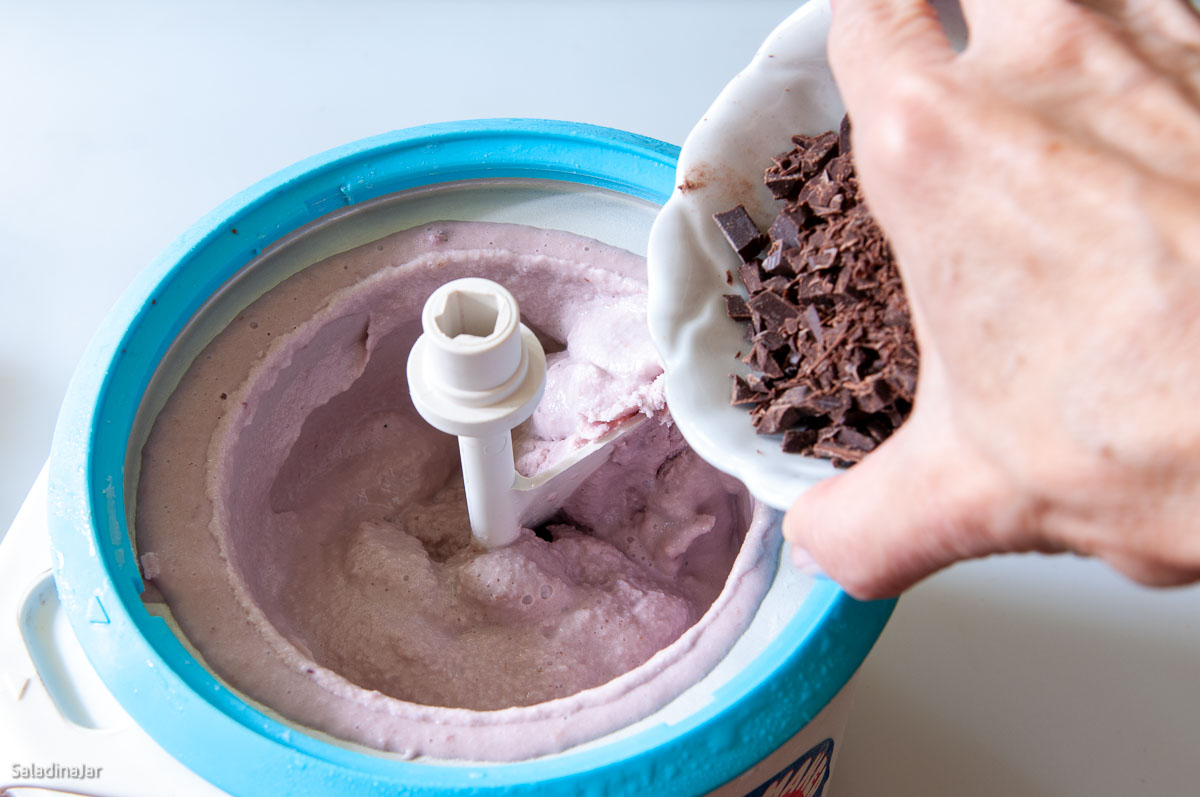 adding chocolate to frozen ice cream