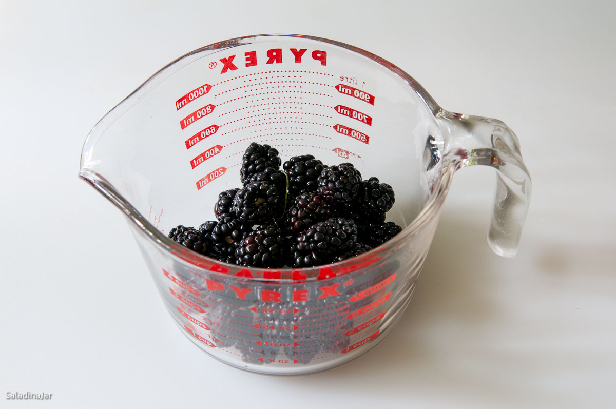 blackberries in a pyrex measuring cup