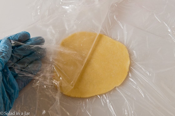 pull plastic wrap off of the top of the flattened dough.