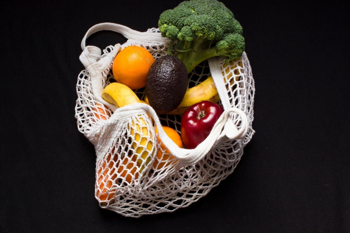 a netted bag holding produce to illustrate the purpose of gluten in bread.