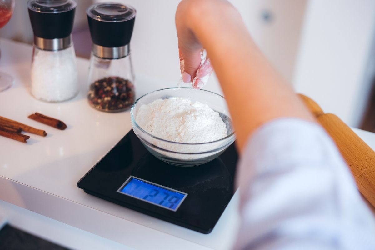 weighing flour with a digital scales