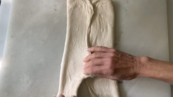 shaping into a batard by fold each side to the middle.