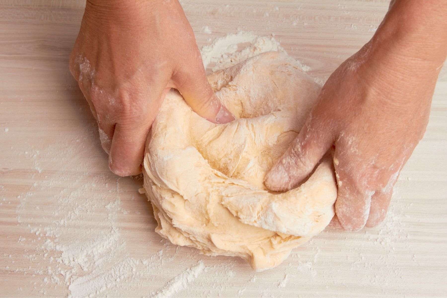 kneading bread at the beginning of the process