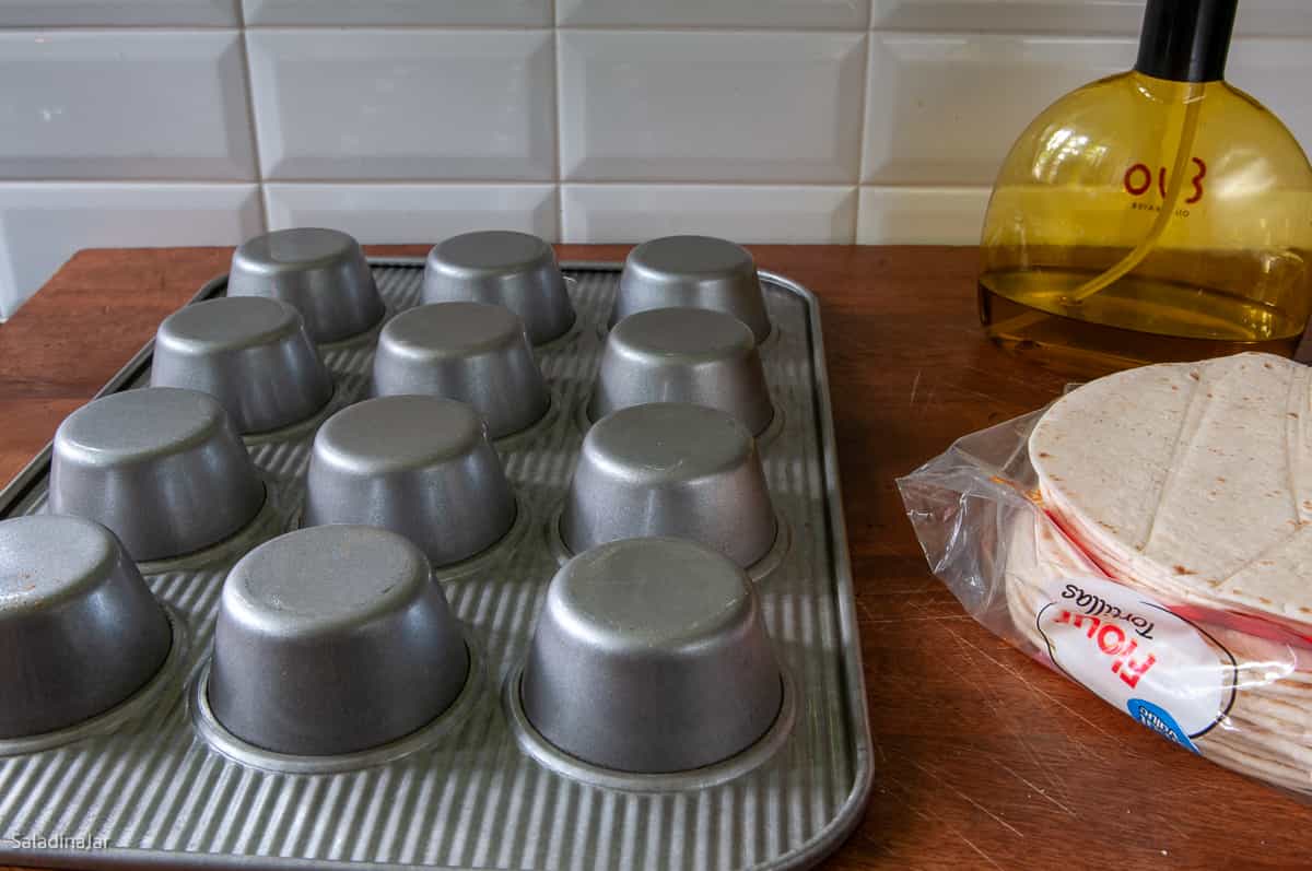 Muffin tin, spray oil and flour tortillas