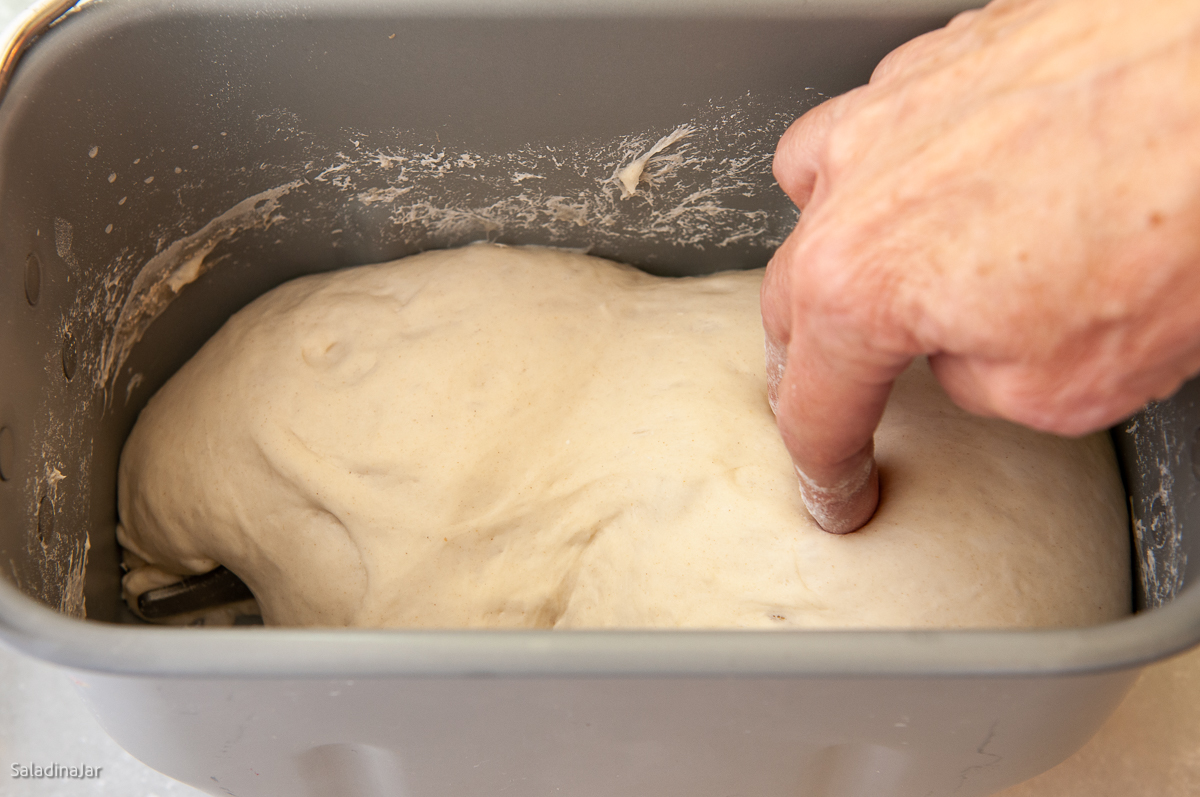 poke fingers into the dough up to your knuckle.