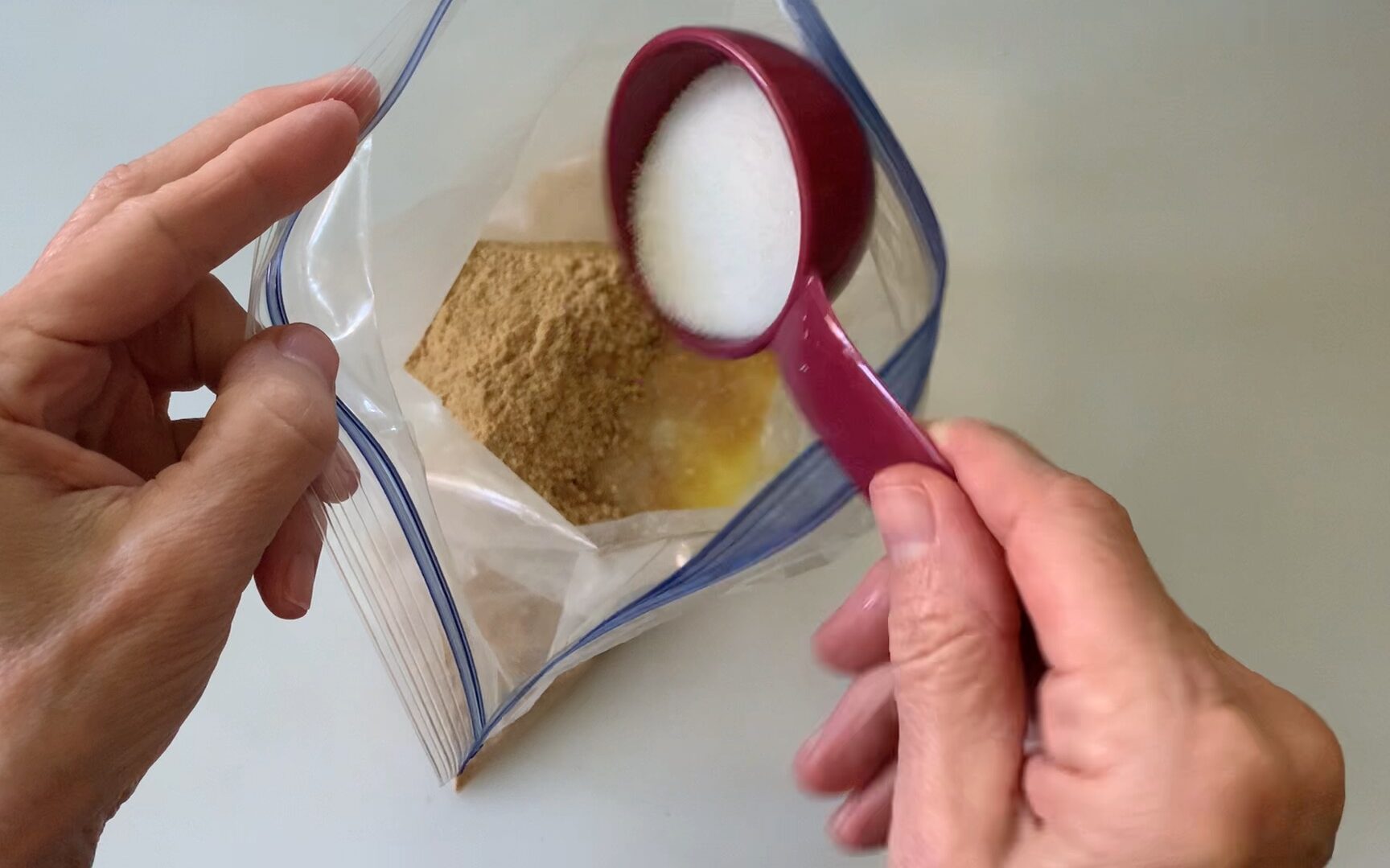 mixing ingredients into graham cracker crust