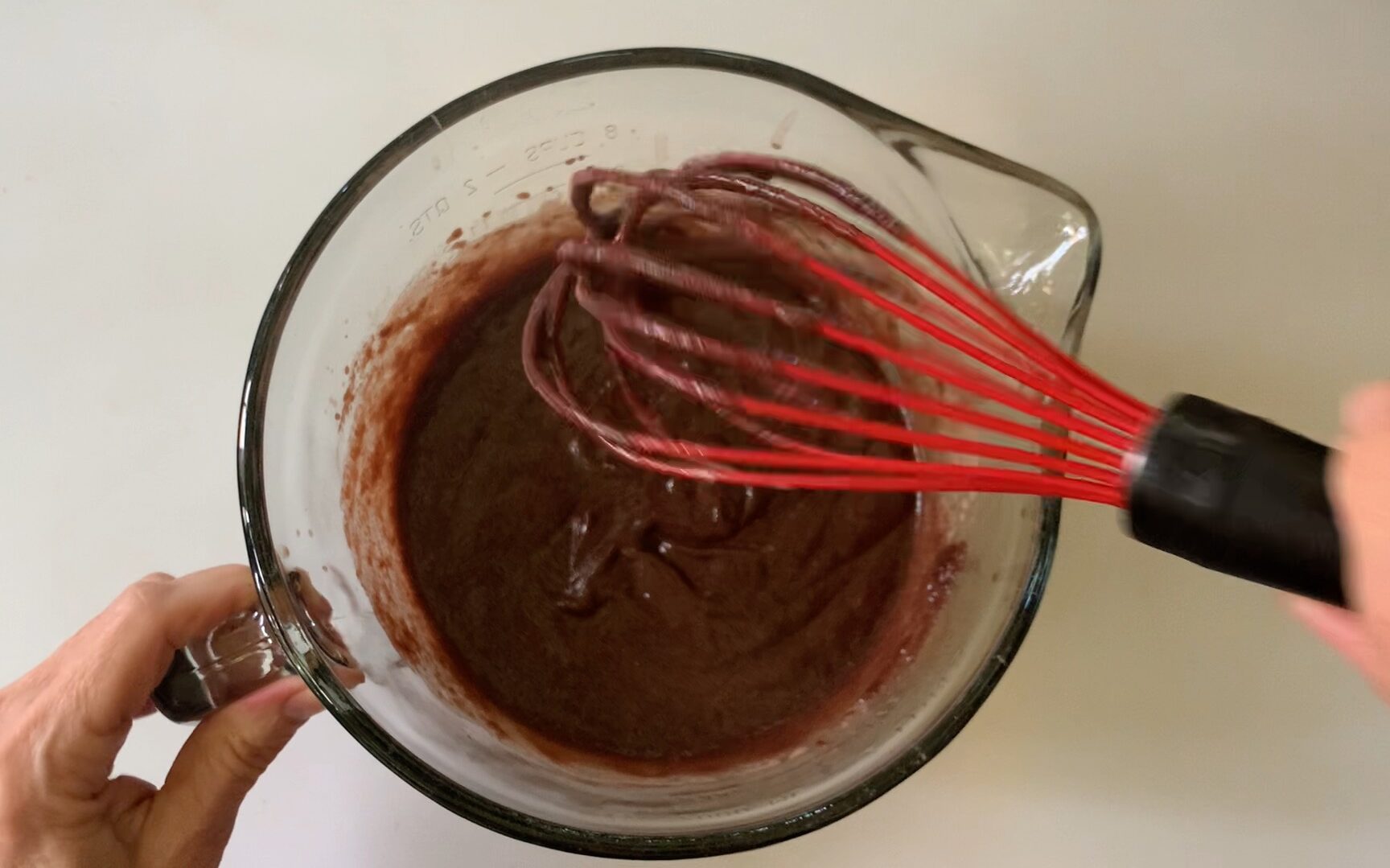 whisking the filling after a few minutes.