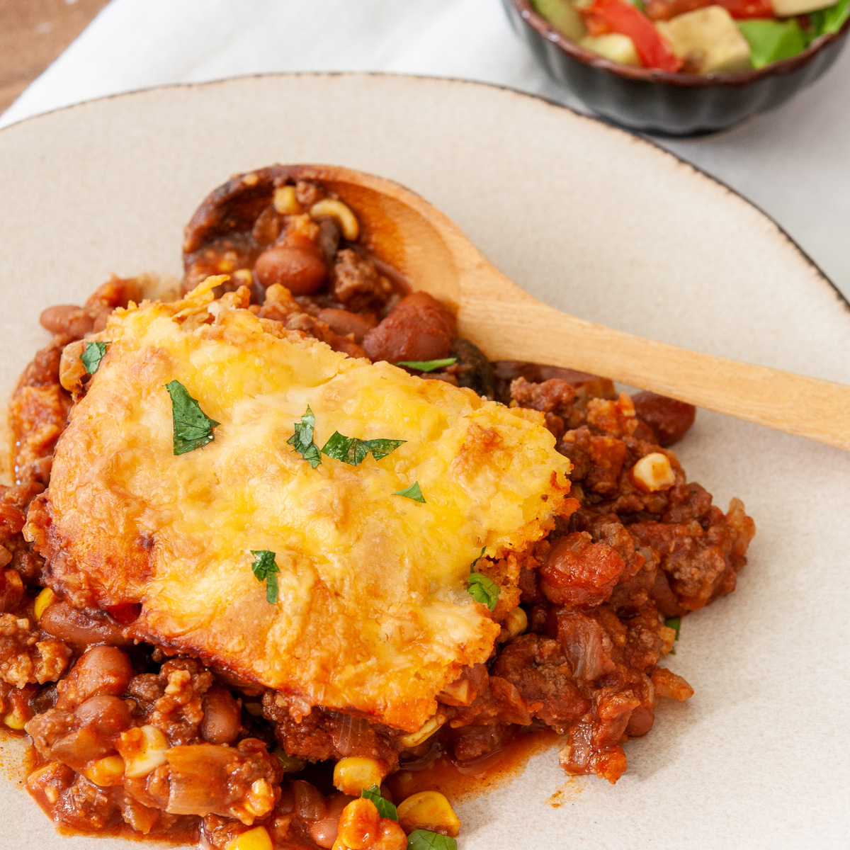 a serving of tamale pie with a cornmeal topping