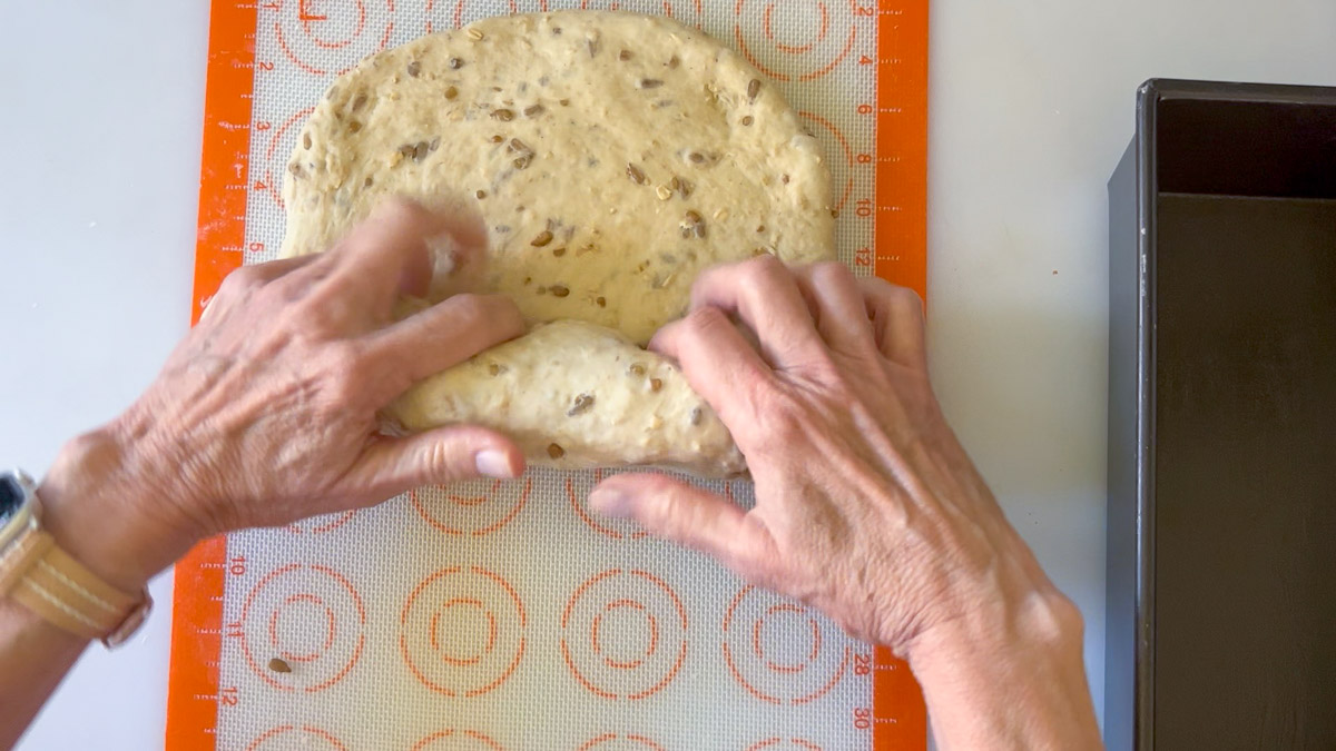 Rolling the dough into a cylinder