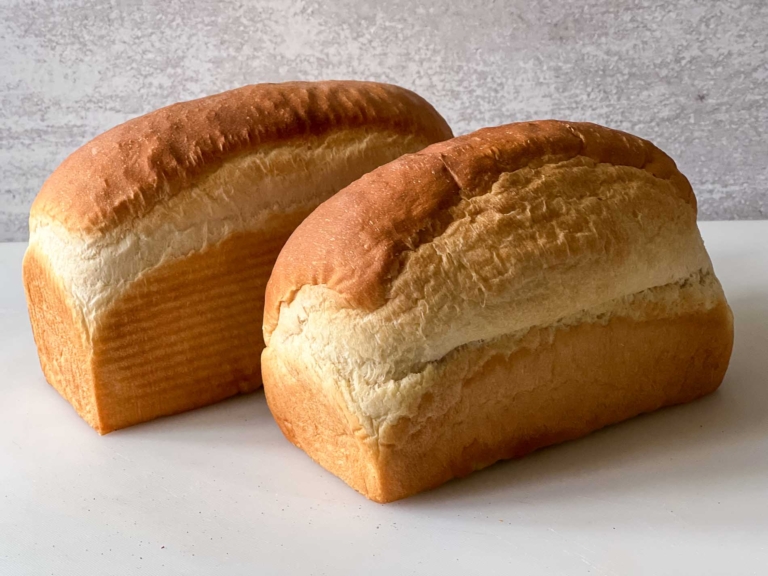 white bread with blow out on one side.
