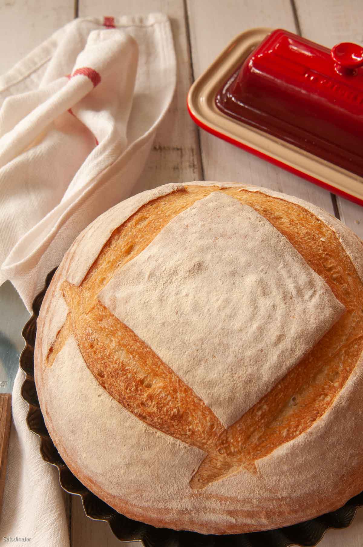 uncut sourdough loaf ready to serve.