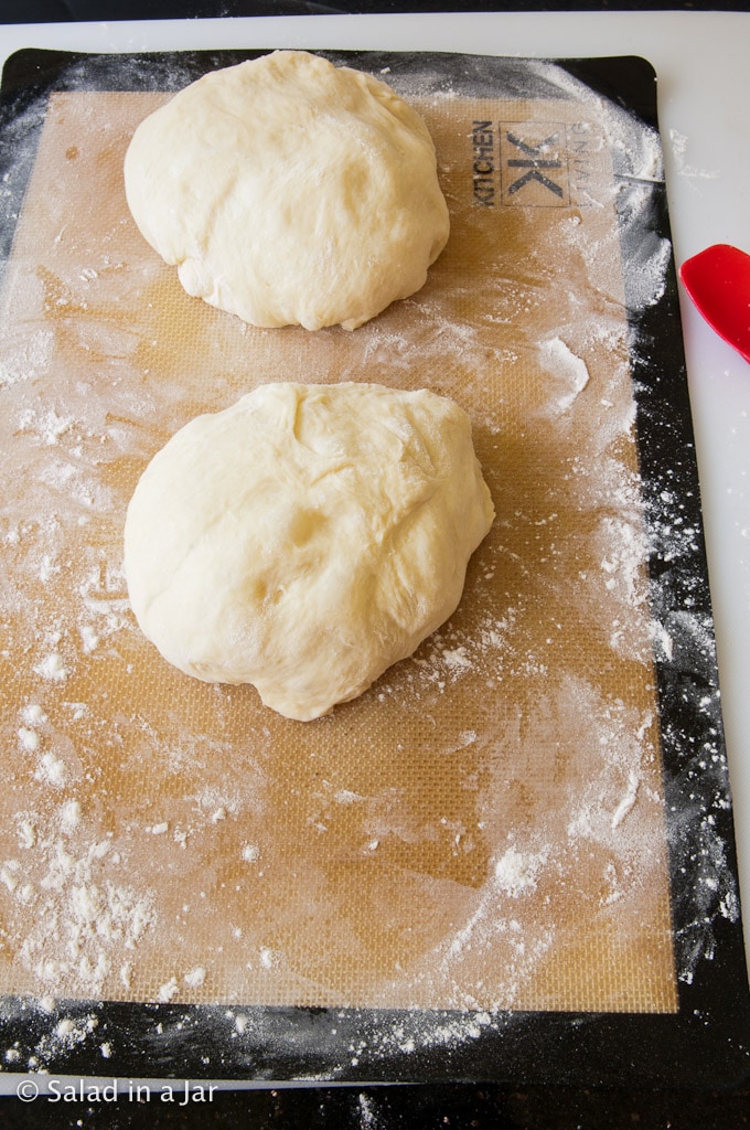 dividing the dough into two portions.