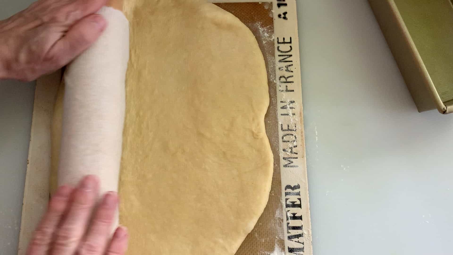 shaping dough into a rectangle